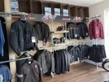 clothing rails made from steel tube and key clamp fittings. Showcasing jackets and coats