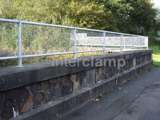 Mesh panel handrail system fitted at railway station for pedestrian barrier 