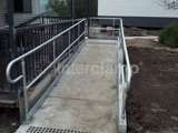 Disability ramp access using Interclamp handrail