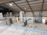 Protection barrier on balcony inside warehouse made from steel tube and Interclamp fittings 