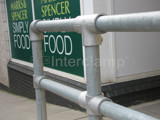 tube clamp fittings on a handrail system for a pedestrian safety barrier 