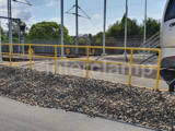 Yellow Powder Coated Safety barriers in Australia by a truck